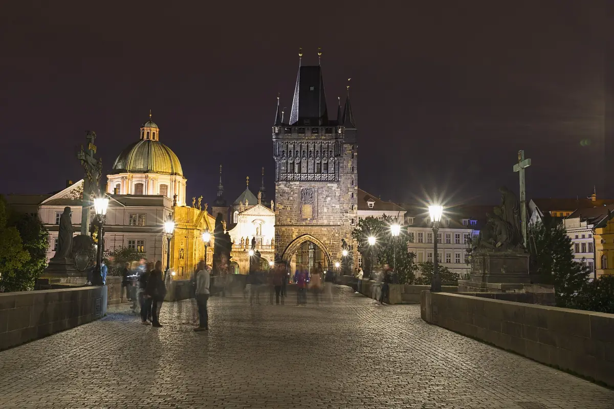 Walking across the bridge at night
