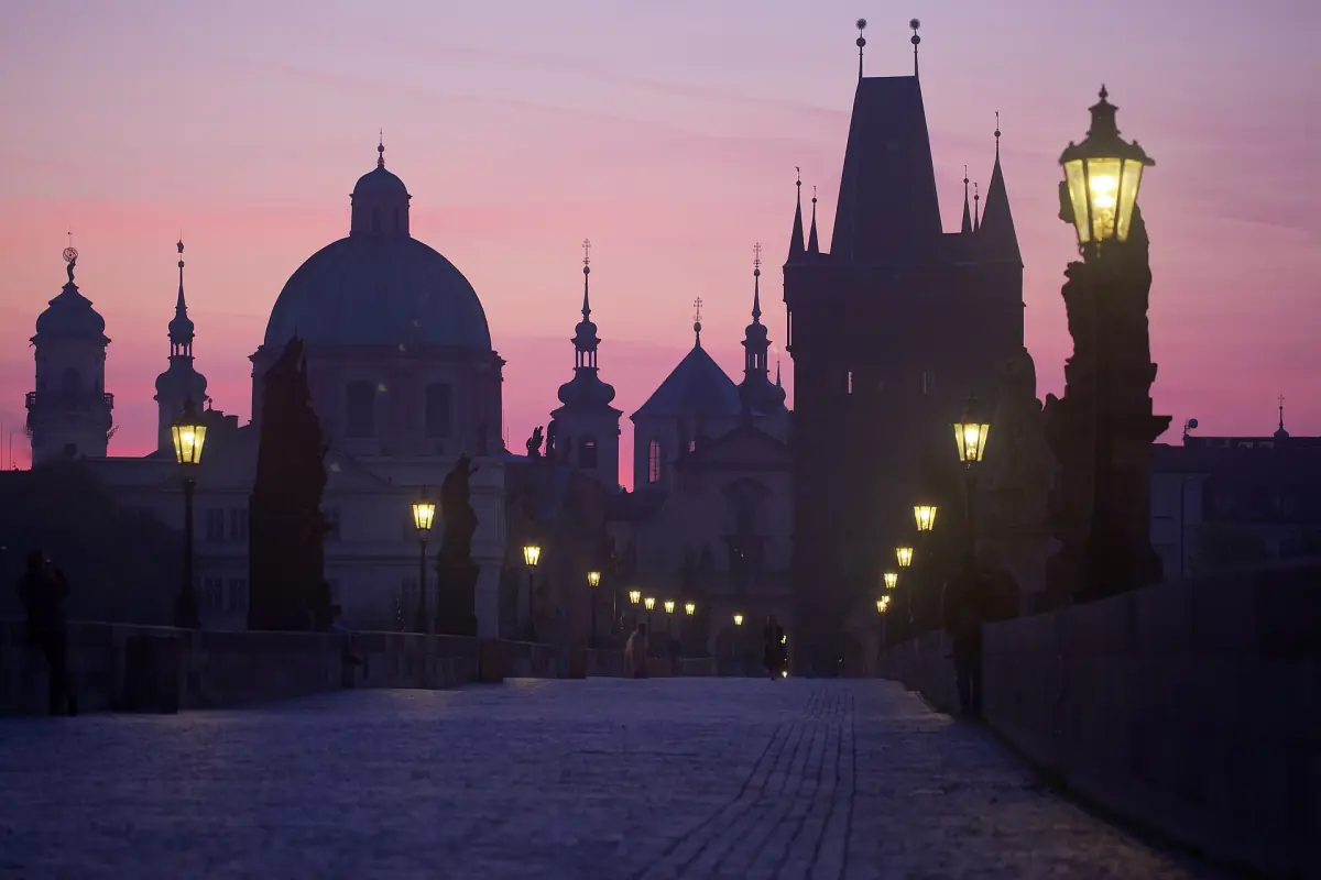 Sunrise on Charles Bridge with its lamps